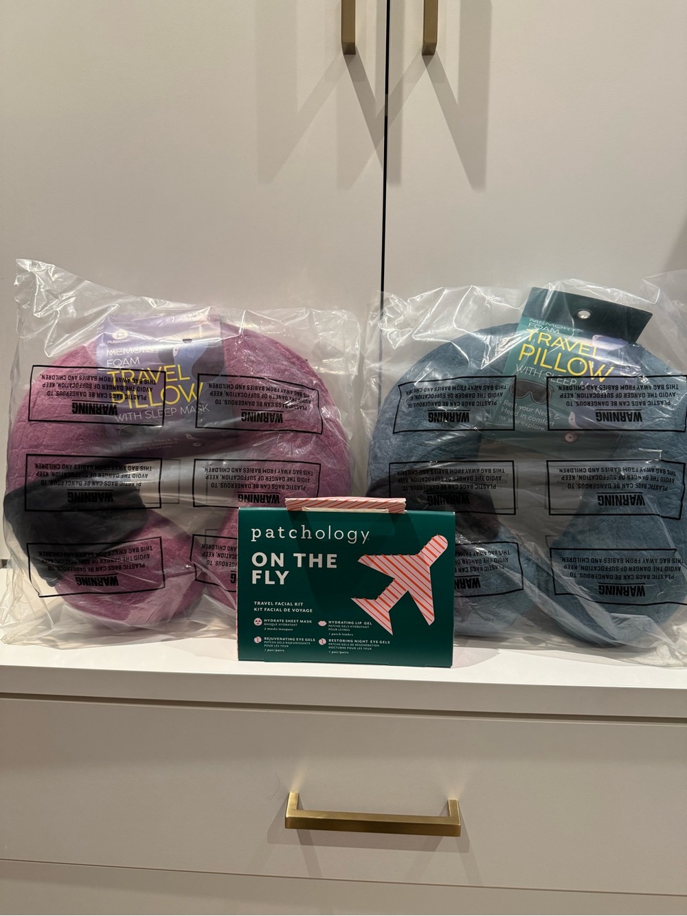 2 Brand New memory foam Travel Pillow Set in Purple and green with eye masks